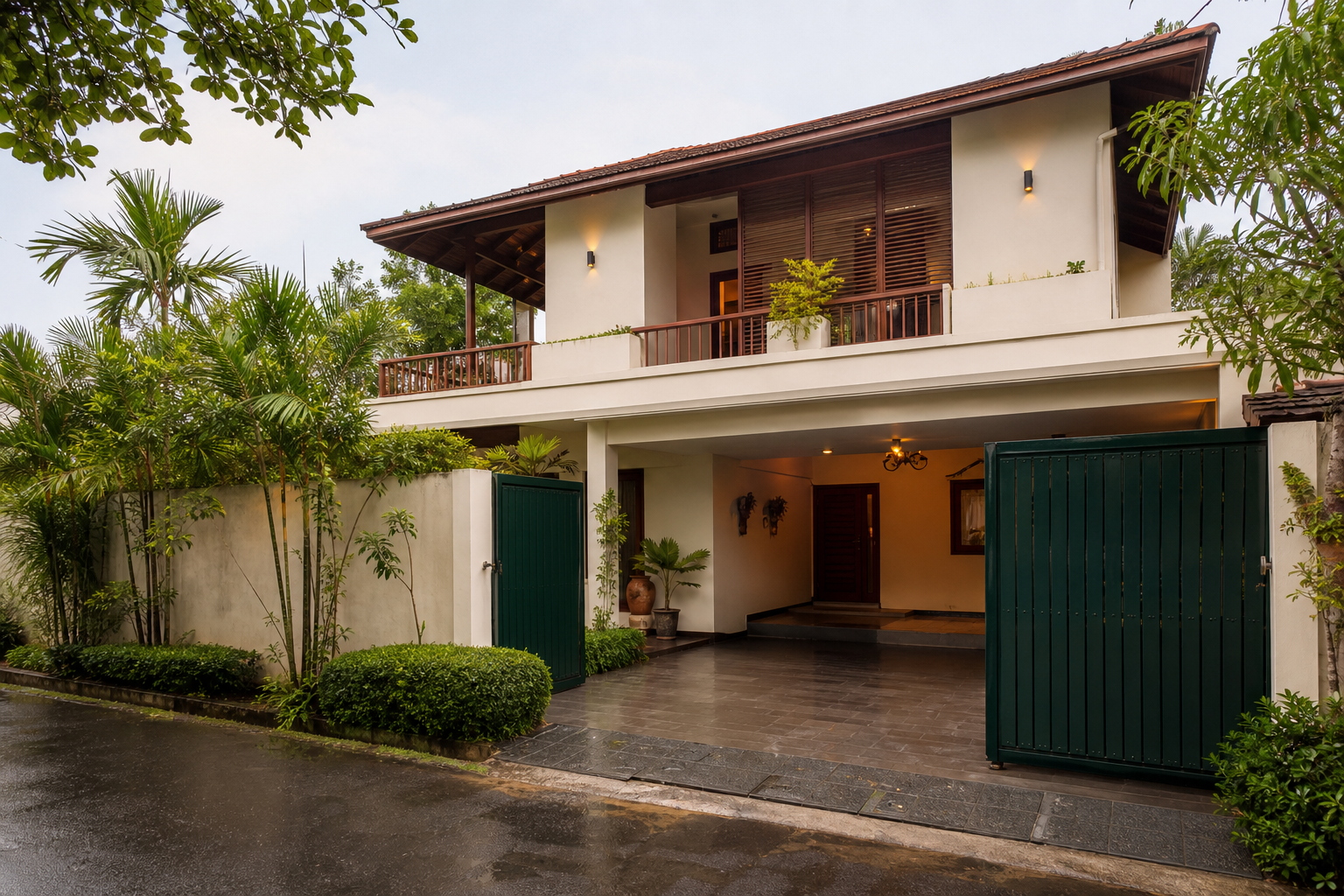 Cream family residence framed by tropical foliage